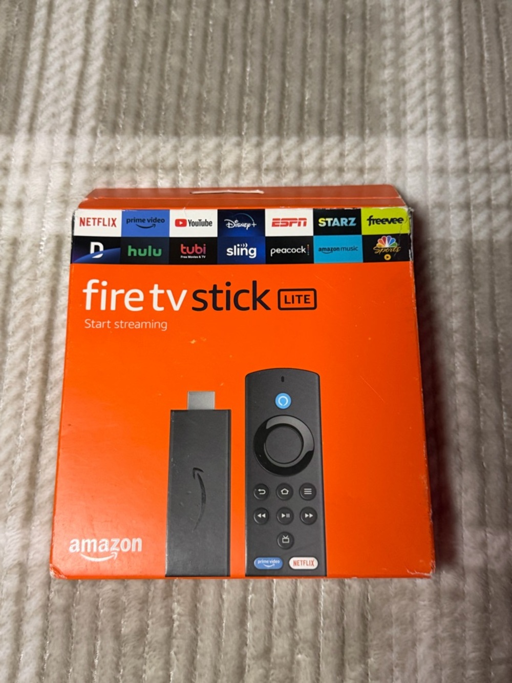 Amazon Fire TV Stick Lite - Bright Orange